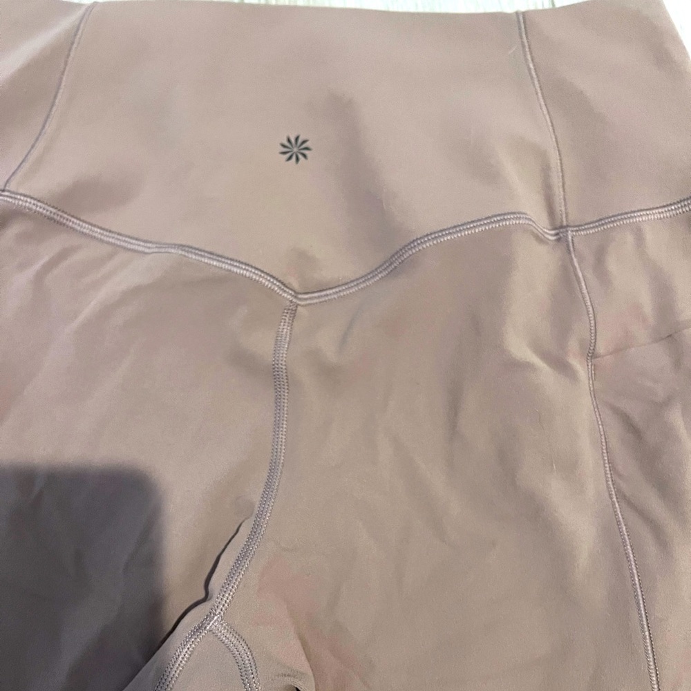 Athleta Salutation Stash leggings L great condition no piling